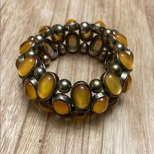 Brown Stretchy Bracelet with Oval Beads and Ornate Metal Frame